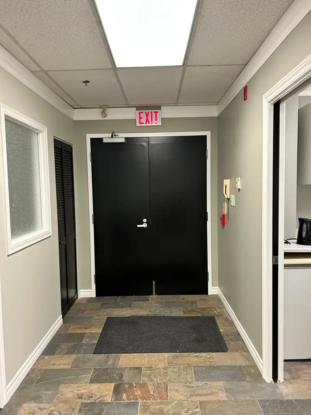 Ground floor office space for lease Mississauga with front-facing windows at Airport Corporate Centre